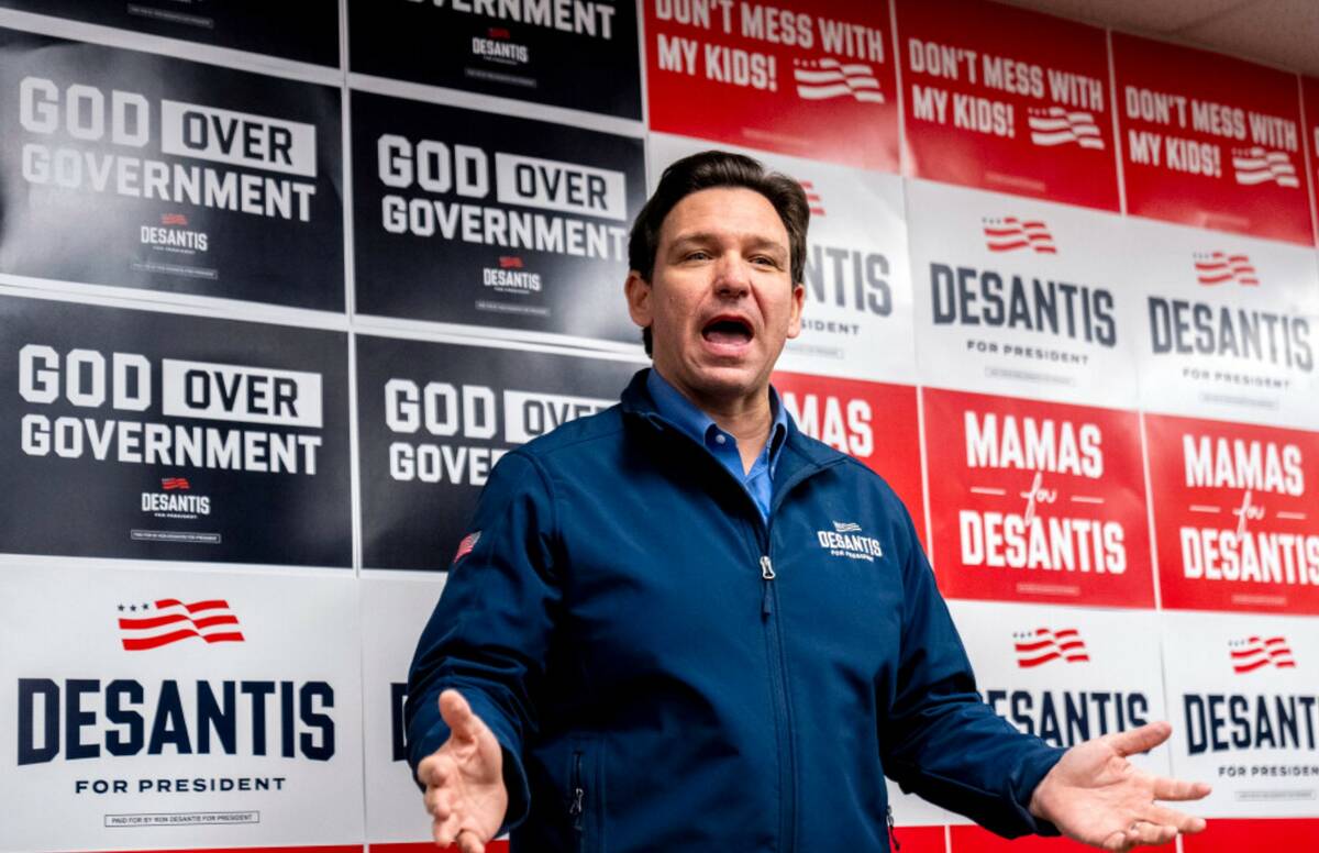 Florida Gov. Ron DeSantis speaks at his campaign office in Urbandale, Iowa, Friday, Jan. 12, 20 ...