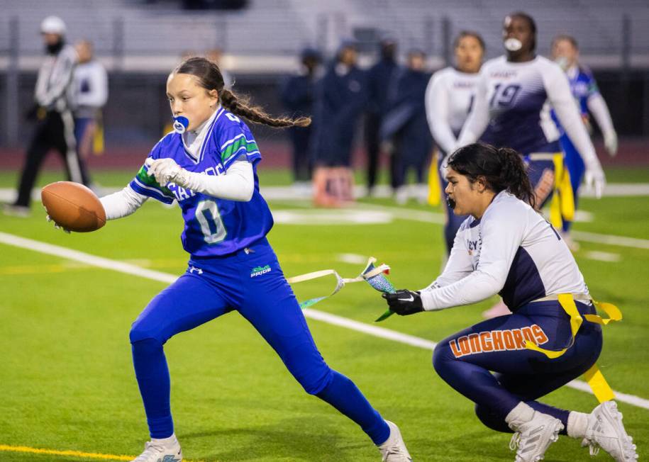 Legacy’s Ariana Munoz (18) pulls the flag off of Green Valley’s Kaylee Montalvo ( ...