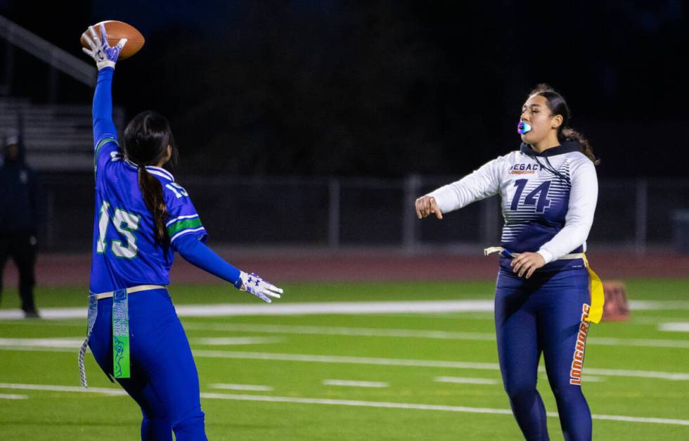 Green Valley’s Leah Tafua (15) blocks a pass made by Legacy’s Karina Alfaro (14) ...