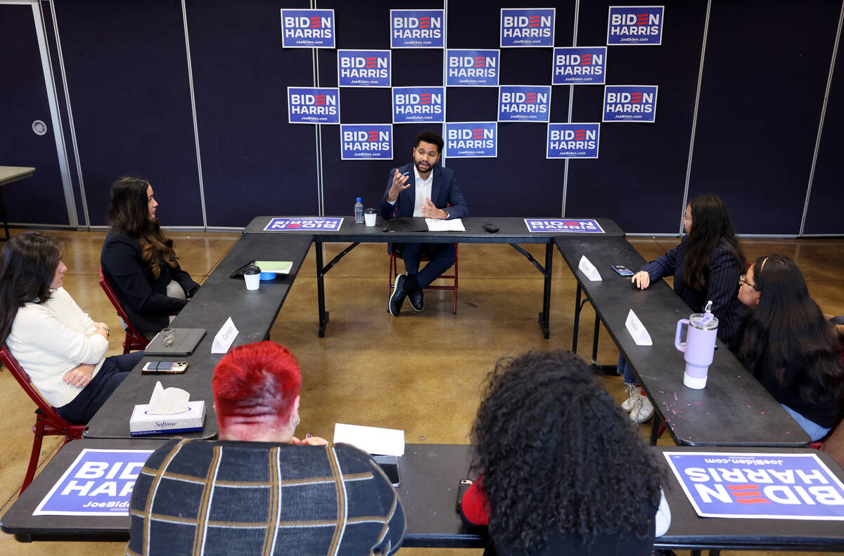 Rep. Maxwell Frost, D-Fla., speaks with UNLV mass shooting survivors during a roundtable discus ...