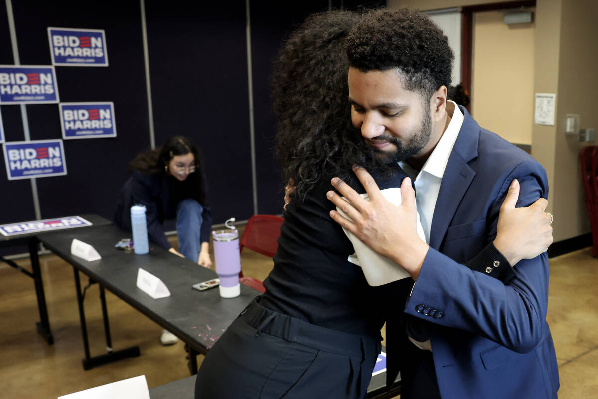 Rep. Maxwell Frost, D-Fla., hugs UNLV mass shooting survivor Taylor Cummings after a roundtable ...