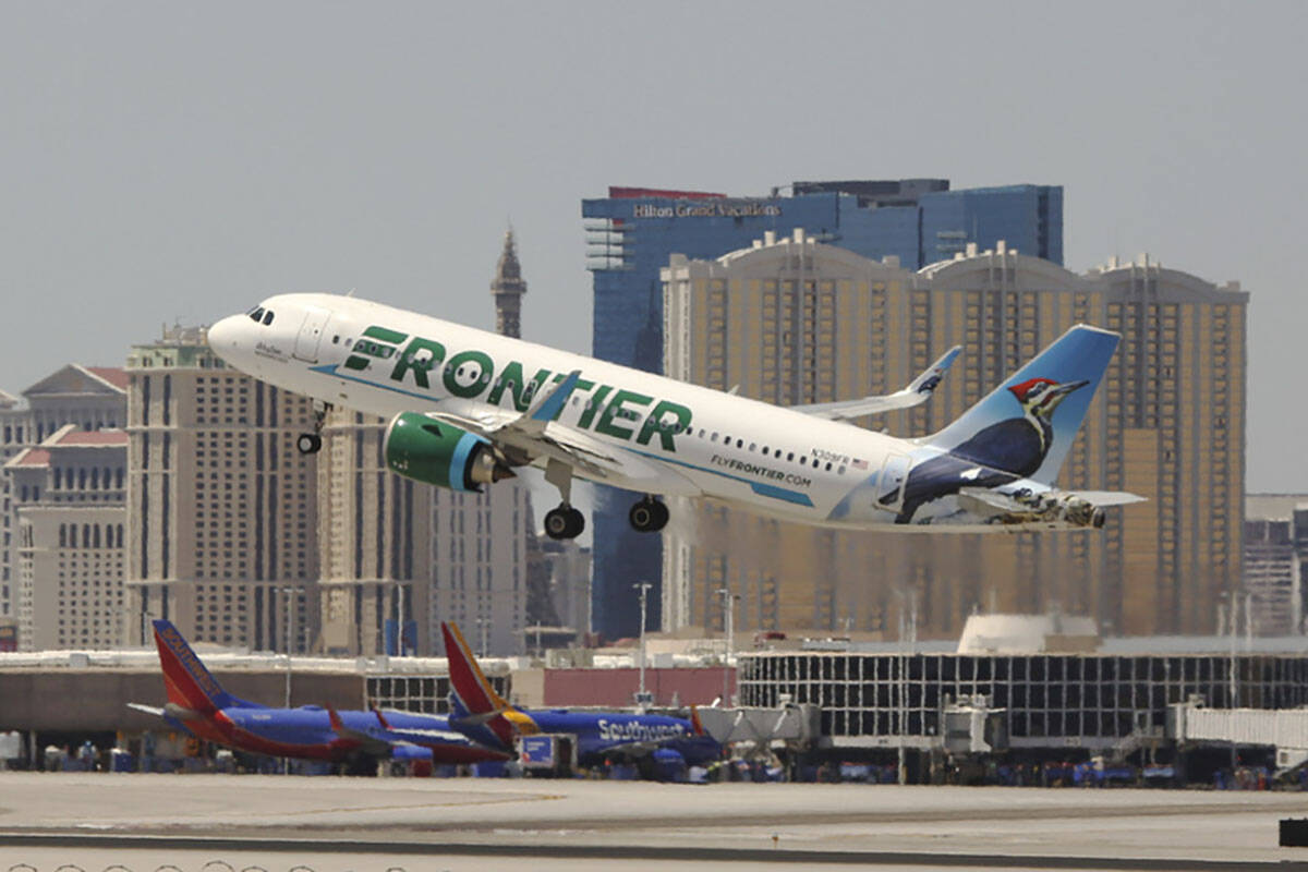 A Frontier Airlines flight departs Harry Reid International Airport in Las Vegas, June 26, 2019 ...