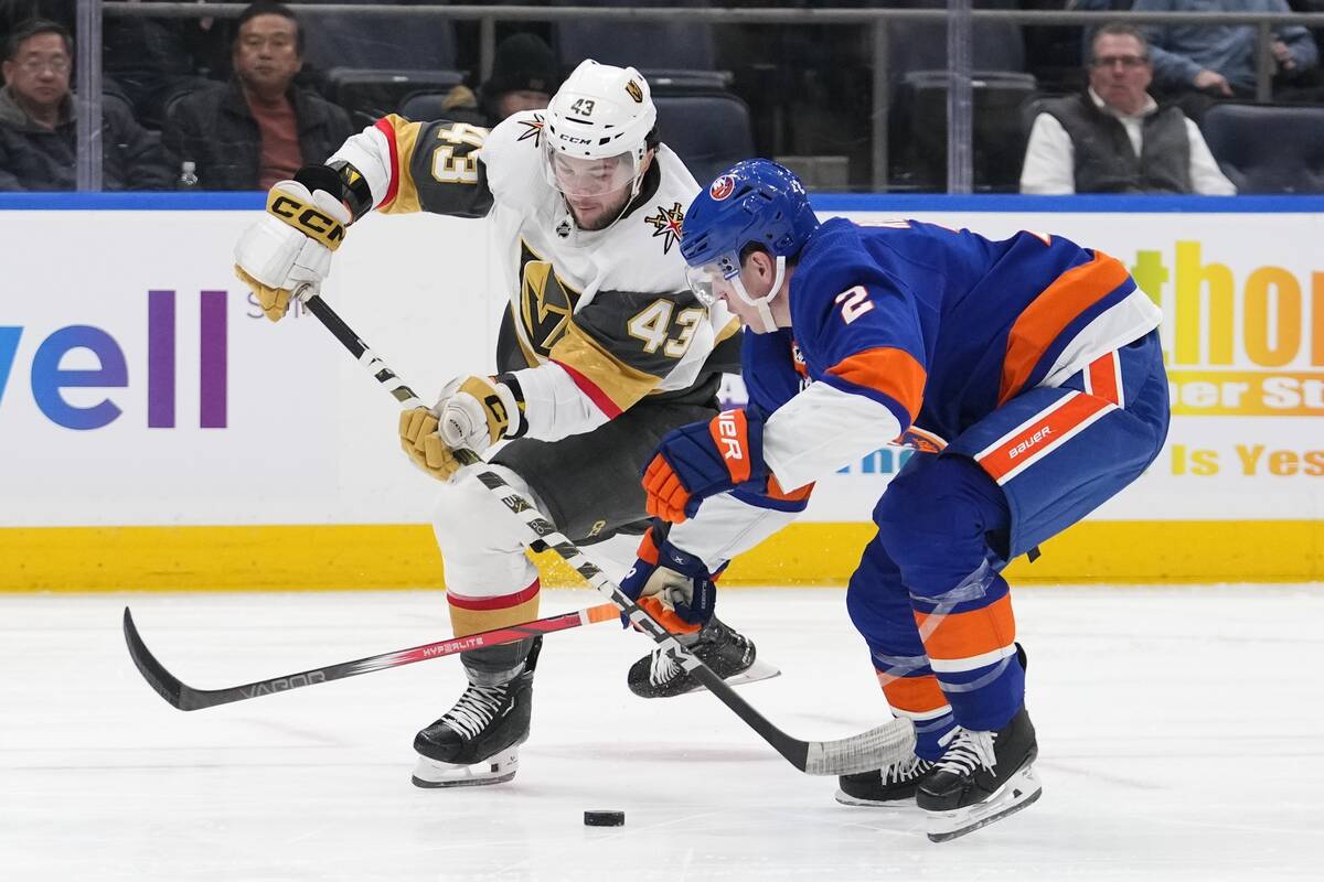 New York Islanders' Mike Reilly (2) defends against Vegas Golden Knights' Paul Cotter (43) duri ...