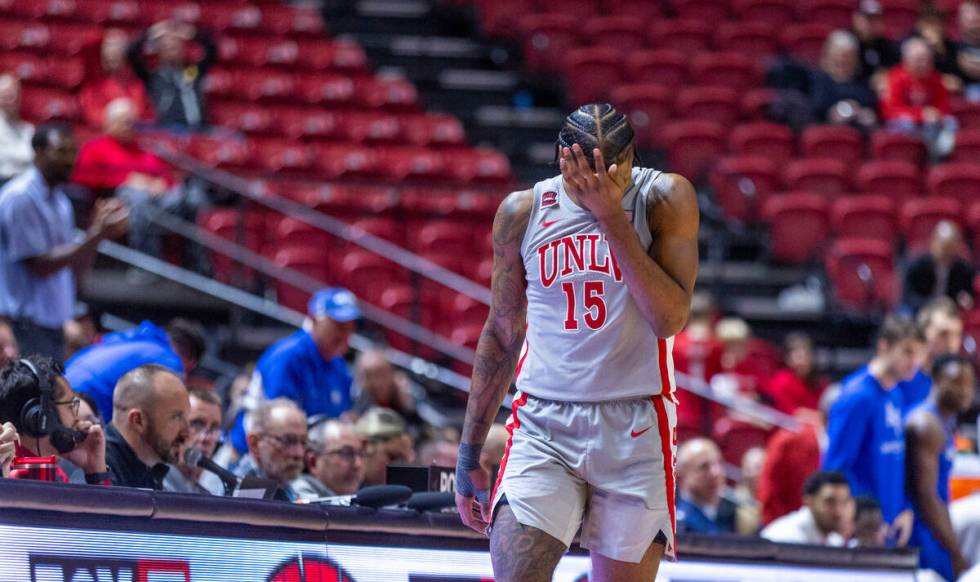 UNLV guard Luis Rodriguez (15) leaves the court dejected as the Air Force Falcons lead late by ...