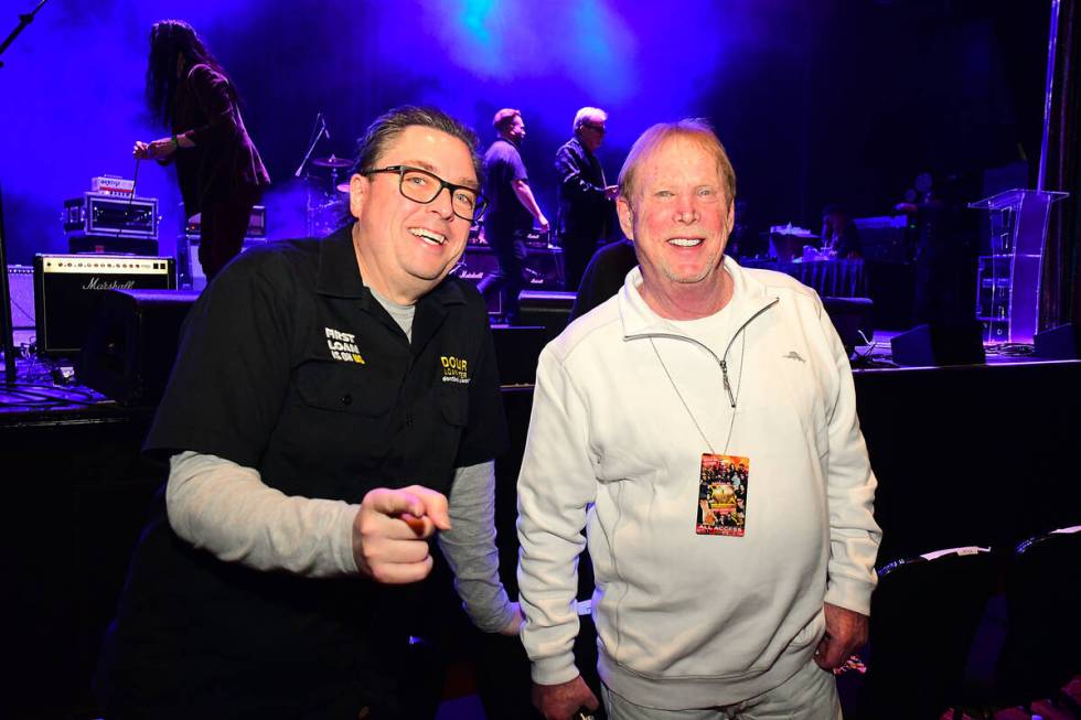 Dollar Loan Center owner Chuck Brennan, left, is shown with Raiders owner Mark Davis at the “ ...