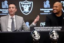Tom Telesco, left, and Antonio Pierce joke about Week 15 Raiders-Chargers score as they are int ...