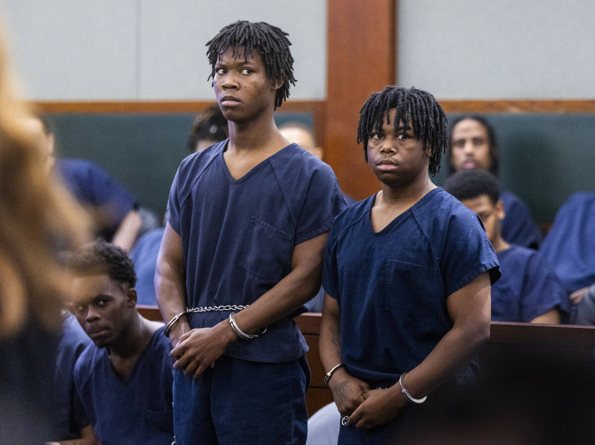 Defendants Dontral Beaver, left, and Gianna Robinson stand the courtroom before Judge Tierra Jo ...