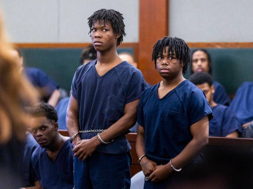 Defendants Dontral Beaver, left, and Gianna Robinson stand the courtroom before Judge Tierra Jo ...