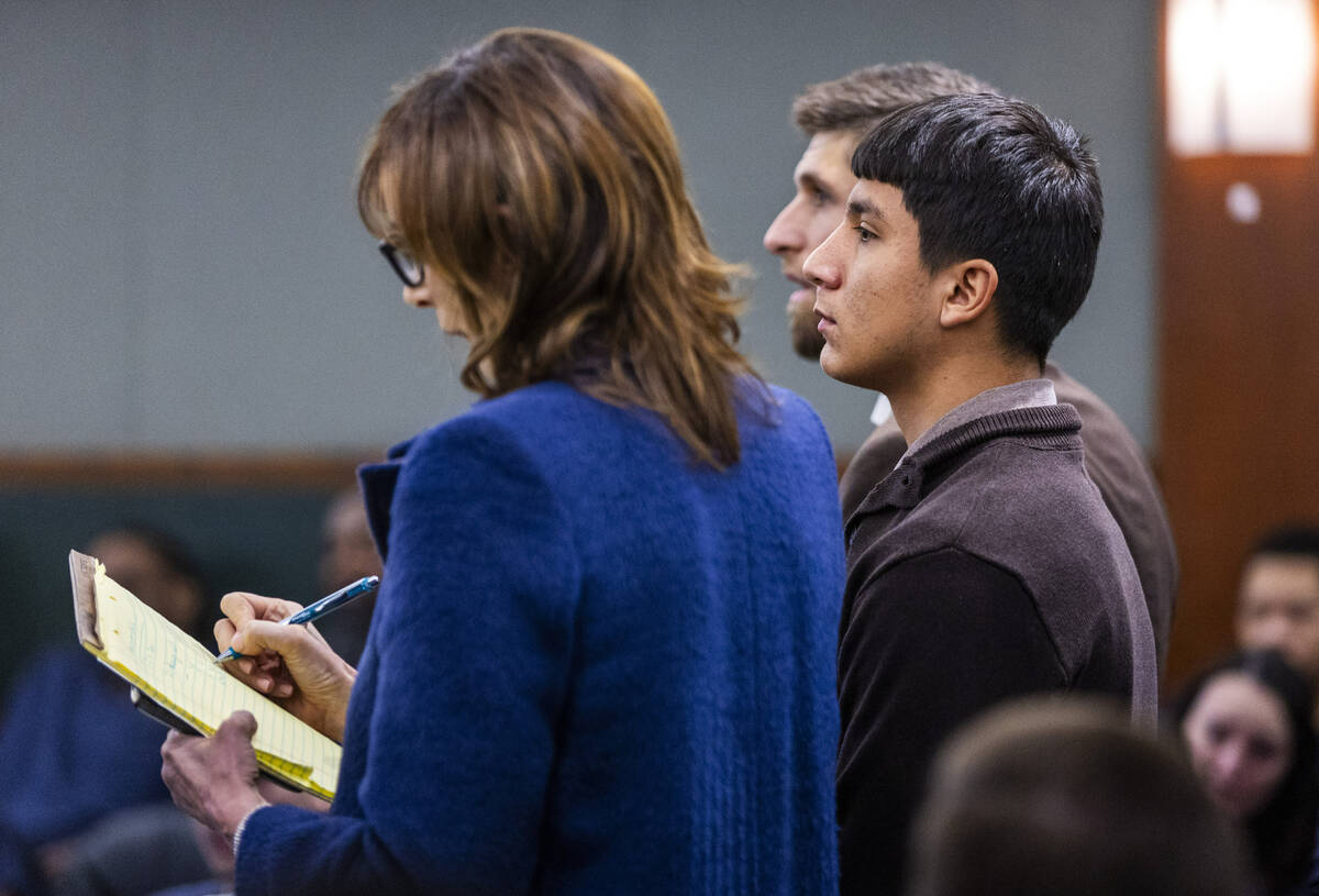 Defendant Damien Hernandez stands before Judge Tierra Jones with attorneys in the Rancho High b ...