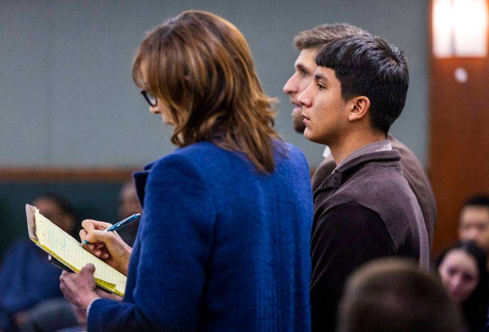 Defendant Damien Hernandez stands before Judge Tierra Jones with attorneys in the Rancho High b ...