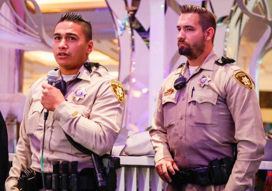 Officers Jacob Noriega, right, and Ty Vesperas are honored with the “Good Ticket” ...