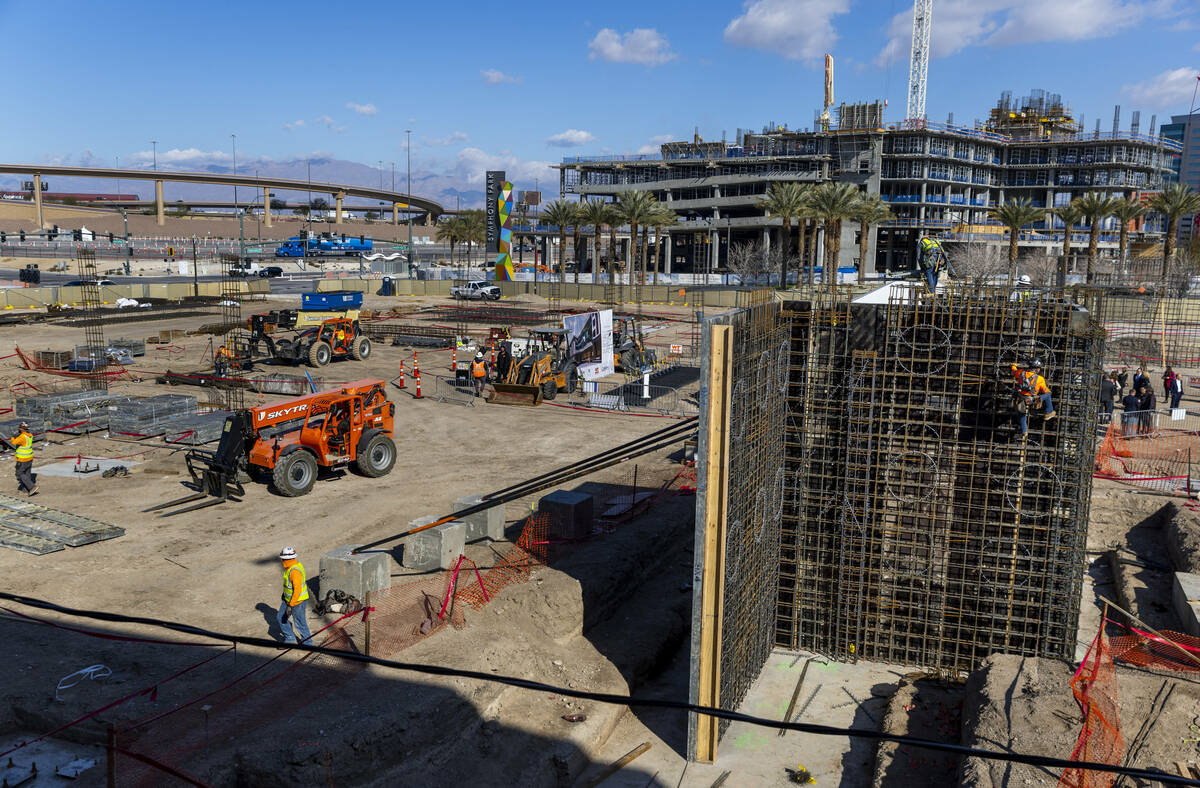 A construction crew works to develop dual hotels during the AC/Element Symphony Park Hotel grou ...