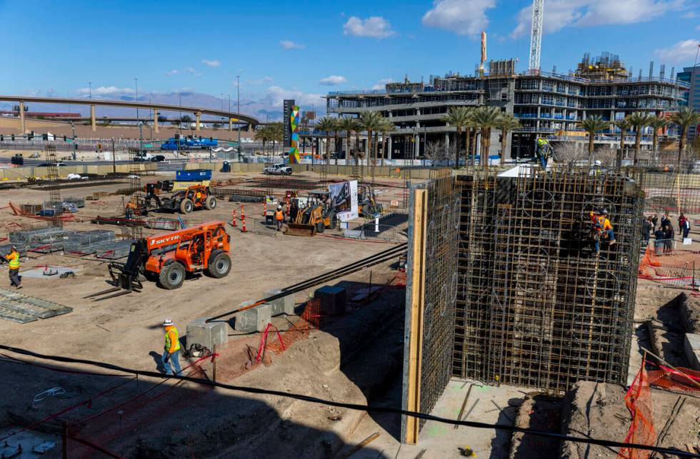 A construction crew works to develop dual hotels during the AC/Element Symphony Park Hotel grou ...