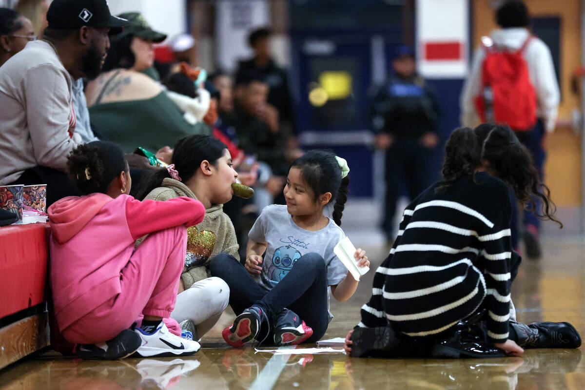Young Liberty fans play during a high school basketball game against Spring Valley at Liberty H ...
