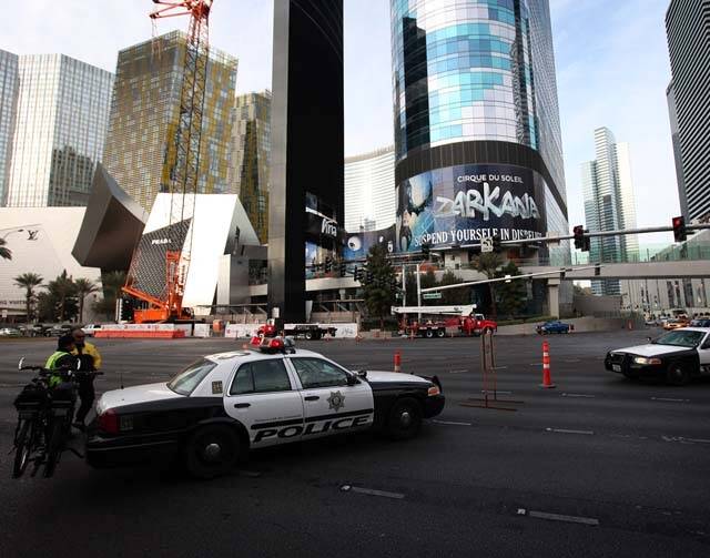 Las Vegas police block Las Vegas Boulevard at Harmon Avenue while investigating a crash in Febr ...