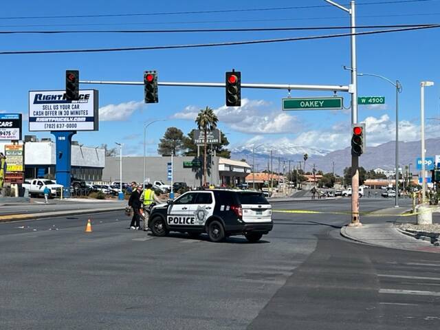 Las Vegas police investigate a crash scene on Decatur Boulevard at Oakey Boulevard in March 202 ...