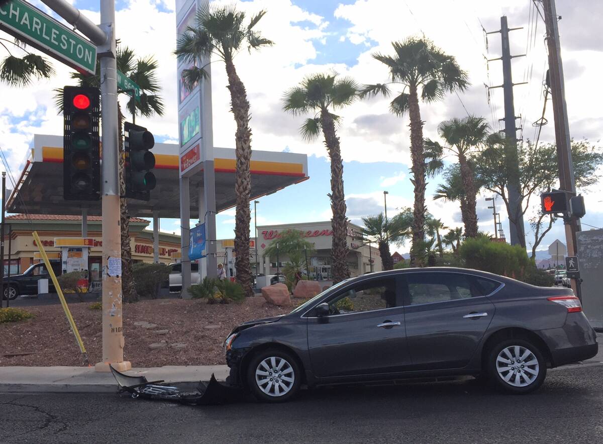 Las Vegas police investigate a three-car crash at Charleston Boulevard and Durango Drive in May ...