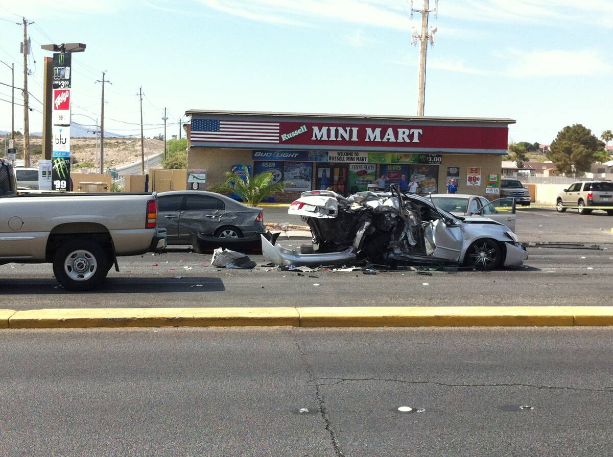 Las Vegas police investigate a crash at Mountain Vista and Russell Road in June 2014. (Las Vega ...
