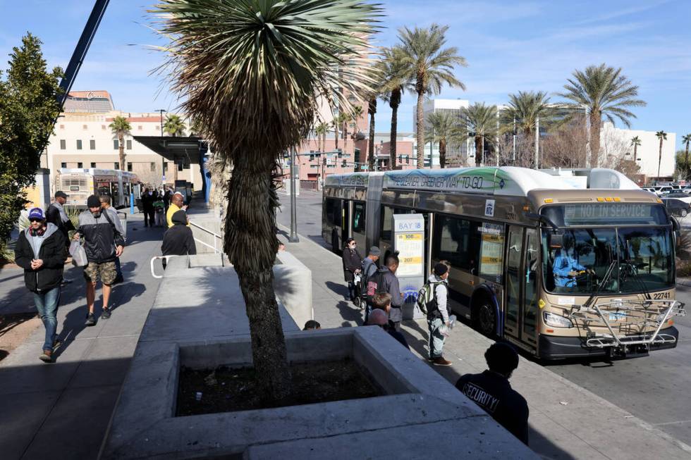 A Regional Transportation Commission bus driver prepares to pick up passengers at Bonneville Tr ...