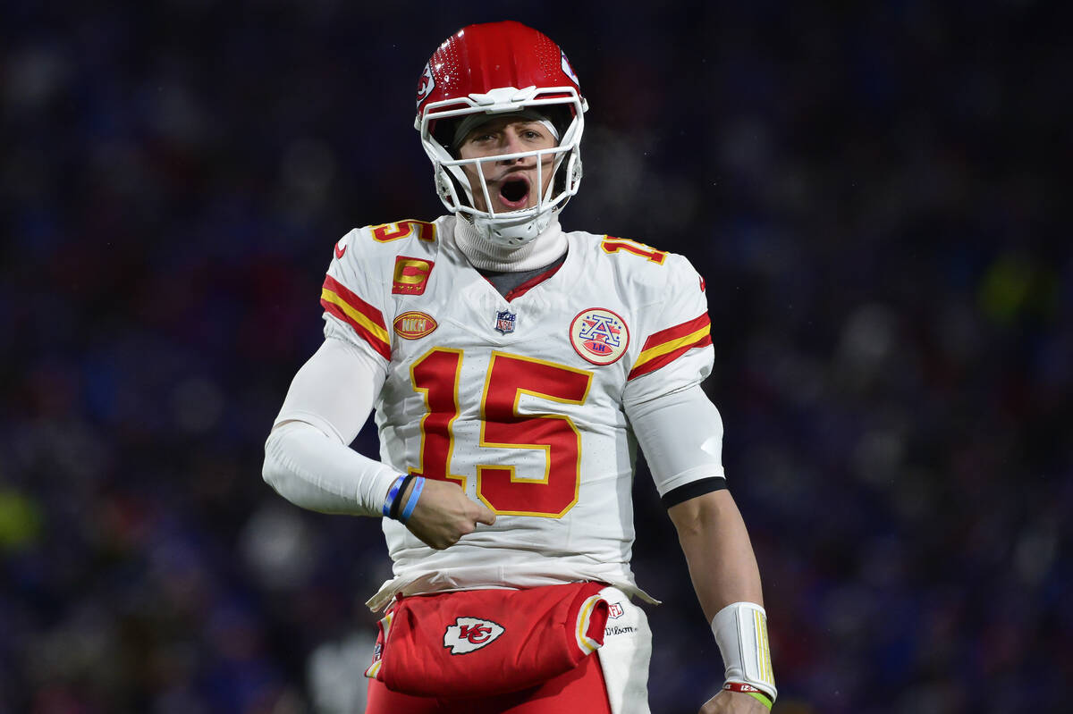 FILE - Kansas City Chiefs quarterback Patrick Mahomes (15) reacts during the second half of an ...