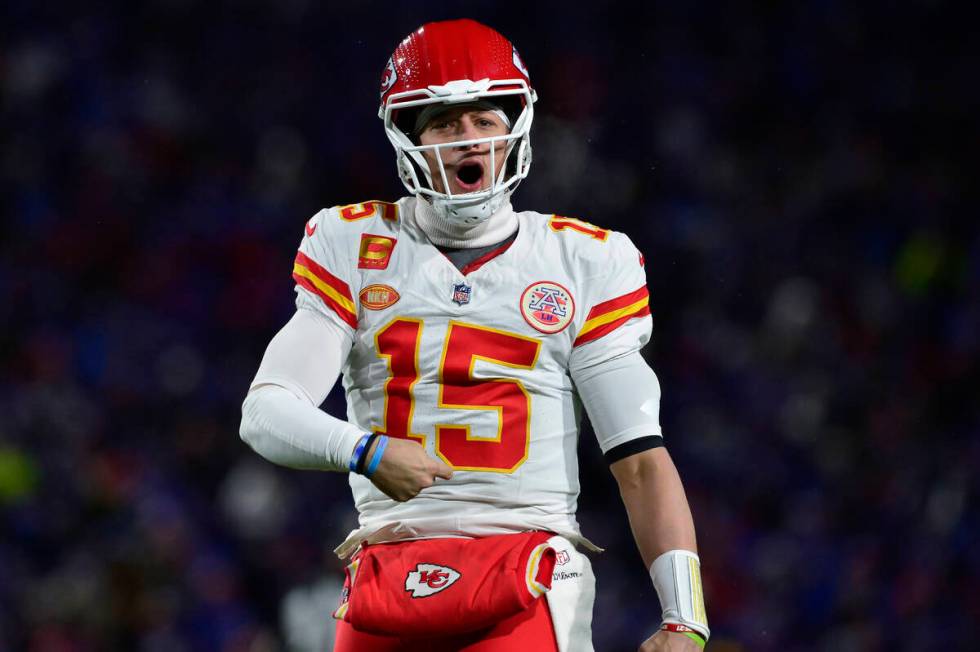 FILE - Kansas City Chiefs quarterback Patrick Mahomes (15) reacts during the second half of an ...
