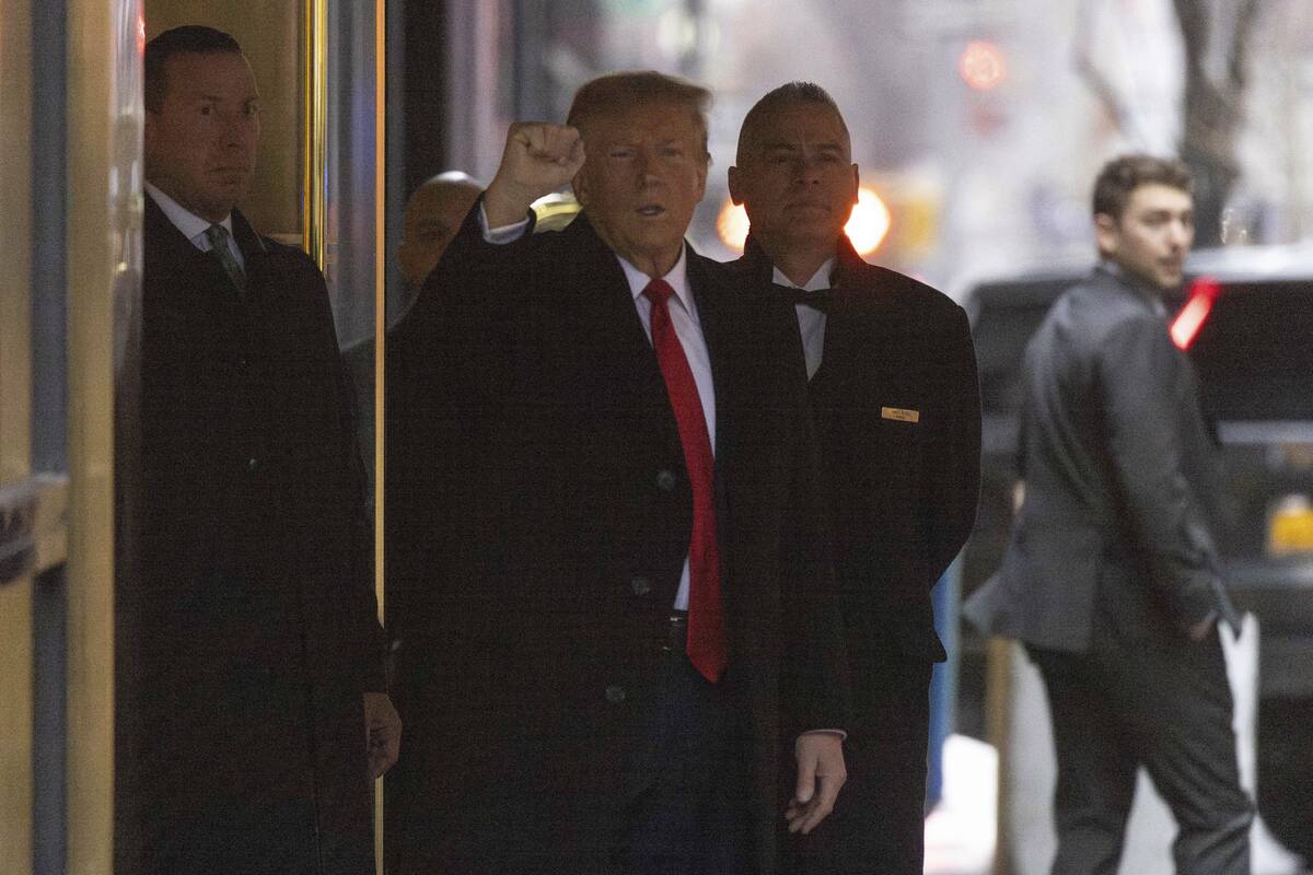 Former President Donald Trump leaves his apartment building, Friday, Jan 26, 2024, in New York. ...