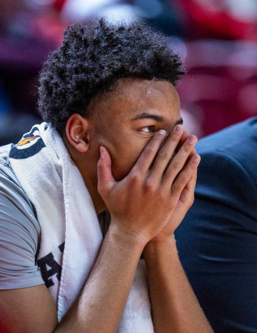 UNLV guard Dedan Thomas Jr. (11) is dejected on the bench as the Air Force Falcons lead by many ...