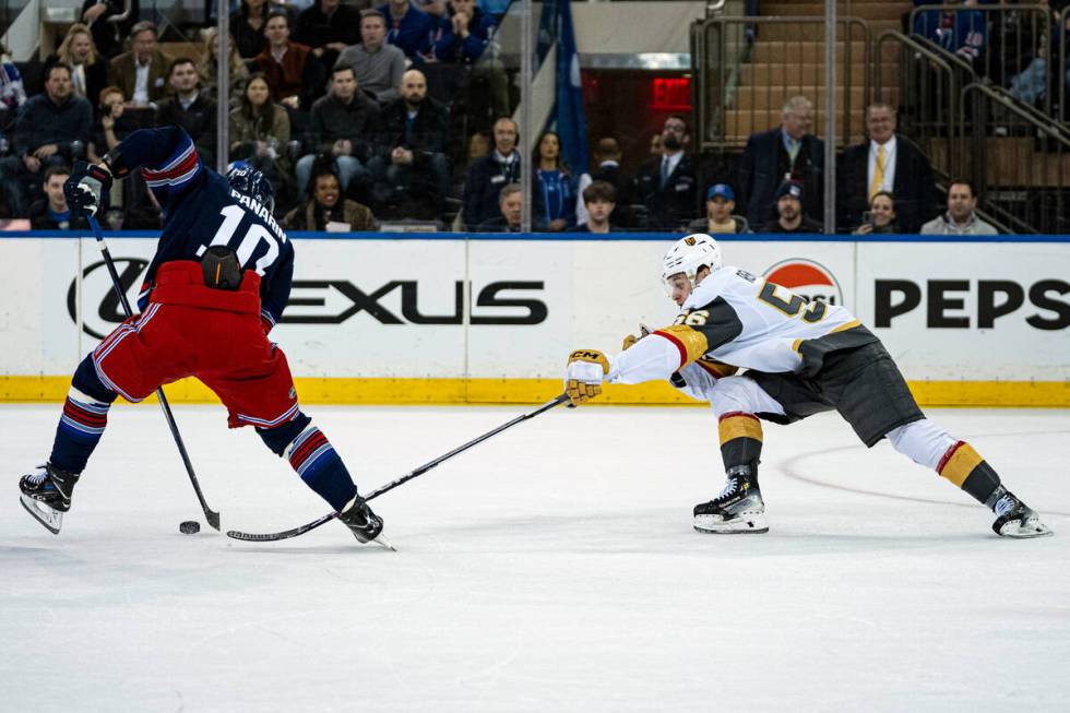 Vegas Golden Knights center Ivan Barbashev (49) shoots at New York Rangers goaltender Igor Shes ...