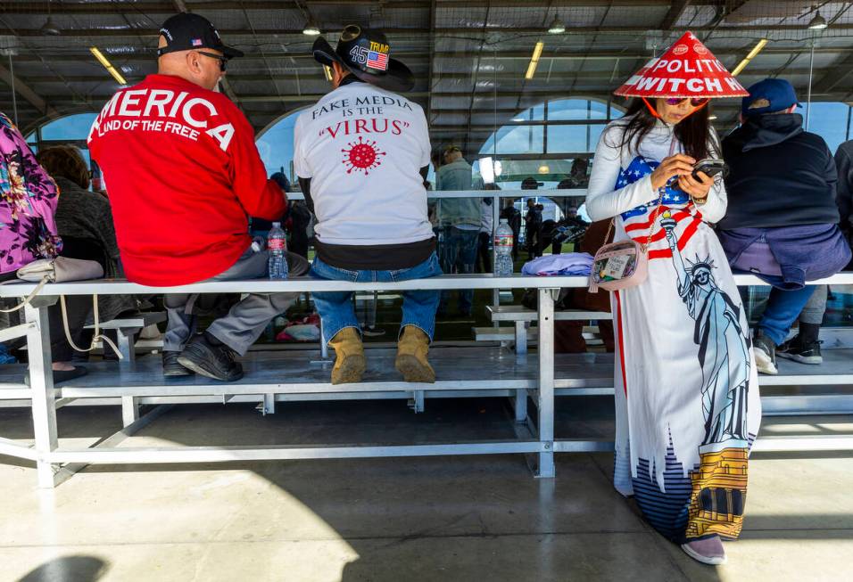 Supporter Kimberly Nguyen of Pasadena waits patiently for the arrival of Republican presidentia ...