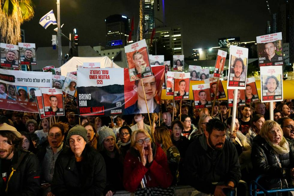 People attend a demonstration demanding the release of the hostages taken by Hamas militants in ...