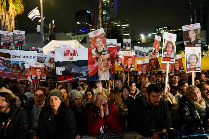 People attend a demonstration demanding the release of the hostages taken by Hamas militants in ...