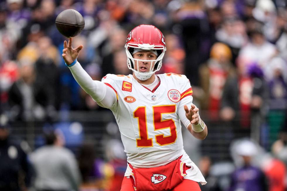 Kansas City Chiefs quarterback Patrick Mahomes (15) passes the ball against the Baltimore Raven ...