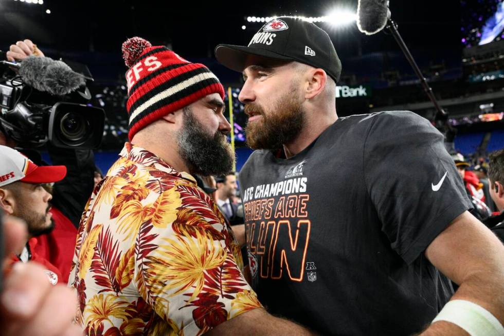 Jason Kelce embraces his brother Kansas City Chiefs tight end Travis Kelce after the AFC Champi ...