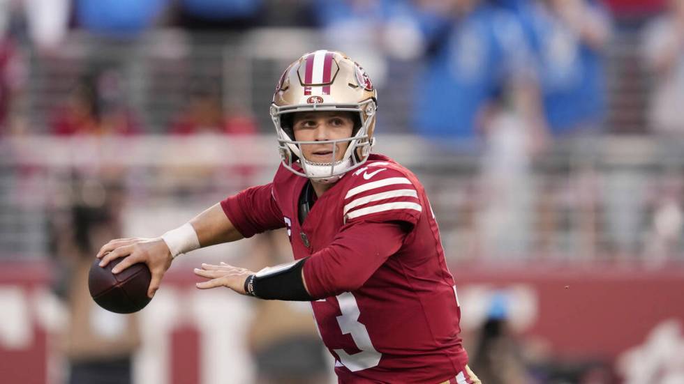 San Francisco 49ers quarterback Brock Purdy passes against the Detroit Lions during the first h ...