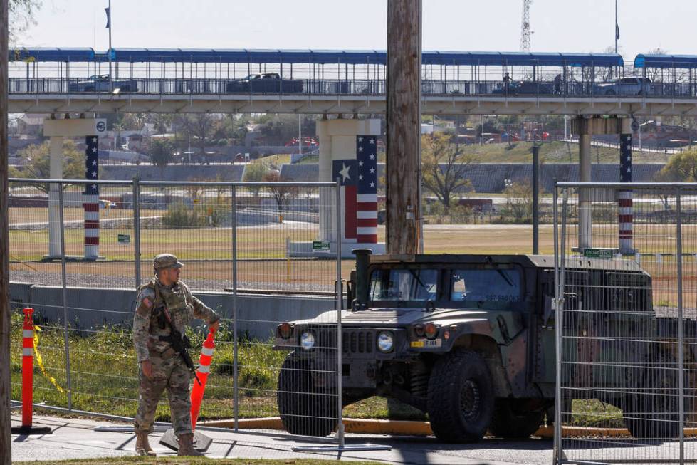 Texas Department of Public Safety officers guard an entrance to Shelby Park on Thursday, Jan. 1 ...