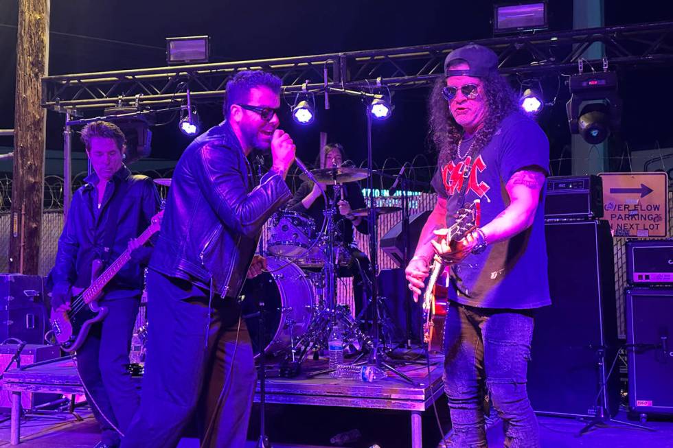 Vocalist Franky Perez jams with Slash at the reopening of Hard Hat Lounge on Industrial Road on ...
