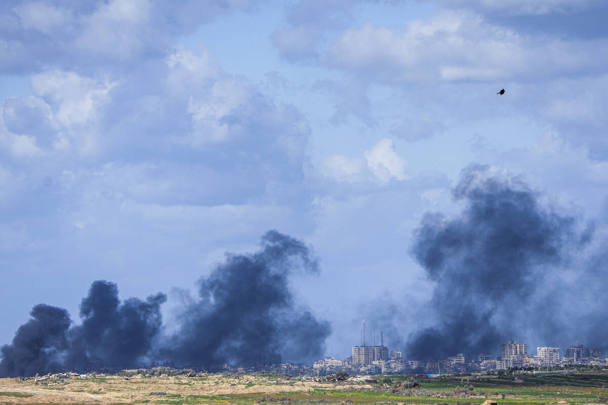 Smoke rises following an Israeli bombardment in the Gaza Strip, as seen from southern IsraelTue ...