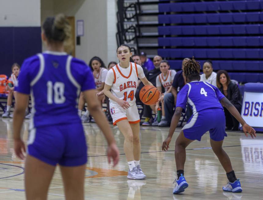 Bishop Gorman’s Kenzie Holton (14) looks to pass in a game against Desert Pines during a ...