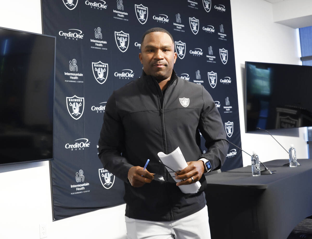Champ Kelly, Raiders interim general manager, leaves the podium after addressing the media at t ...