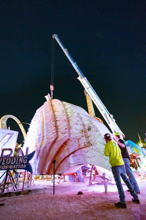 A large portion of a 1970s Flamingo Hotel & Casino sign is moved by crane on Tuesday, Jan. 30, ...