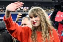 Taylor Swift waves after the AFC Championship NFL football game between the Baltimore Ravens an ...