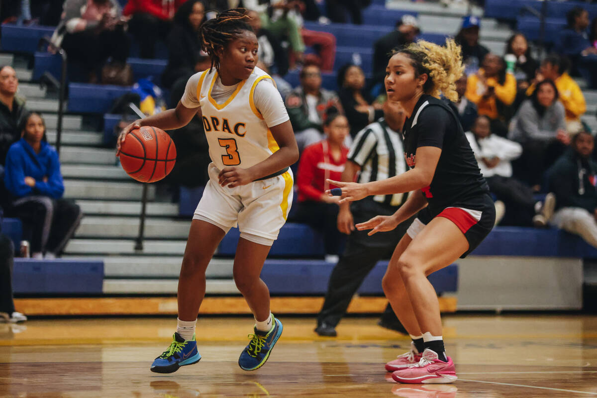 Democracy Prep’s Bray’ana Miles (3) dribbles the ball as she looks to a teammate ...