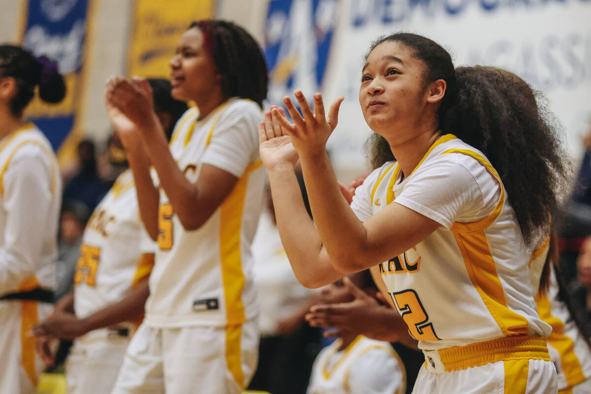 Democracy Prep’s Diamond Zvulun (12) claps for her team as they try to narrow the scorin ...