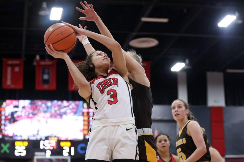 UNLV Lady Rebels guard Kiara Jackson (3) shoots against Wyoming Cowgirls guard Ola Ustowska (30 ...