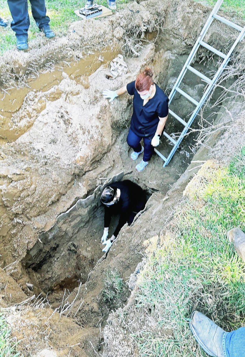 This is an undated handout photo of the exhumation of the body of Thomas Martin Elliott, who po ...