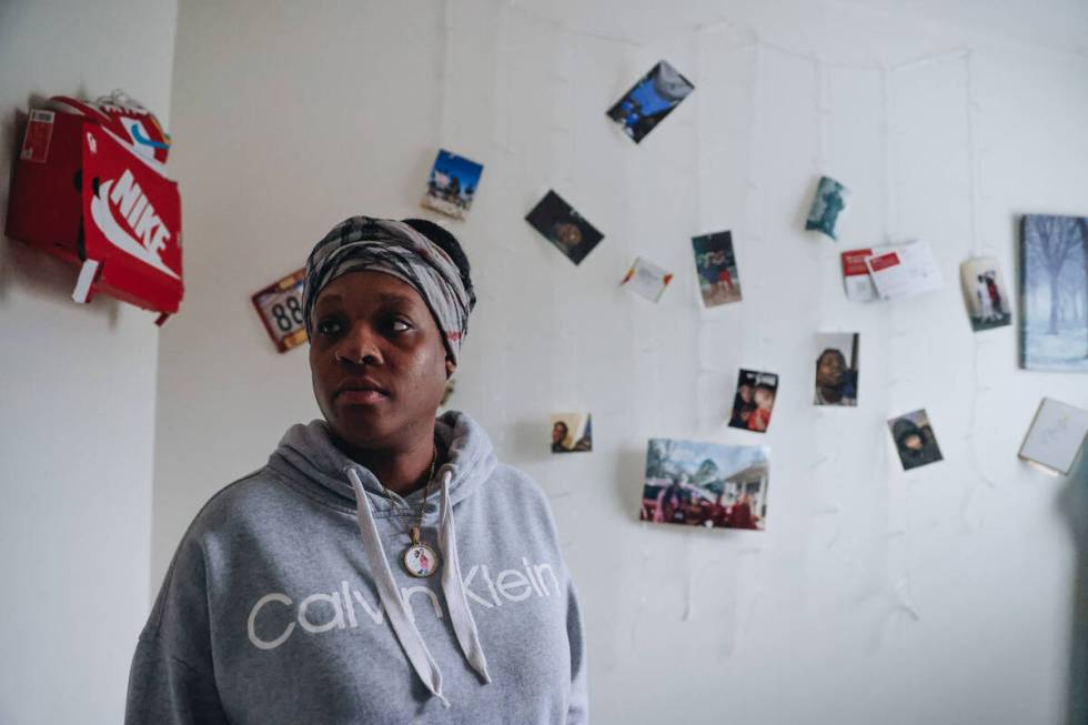 Katherine Patrick stands inside of a memorial room that she made in honor of her two sons, Adri ...