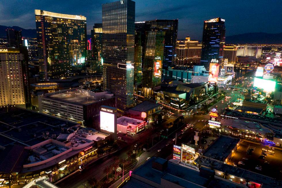 Aerial view of the Las Vegas Strip at looking north sunset on Wednesday, January 12, 2022. (Las ...