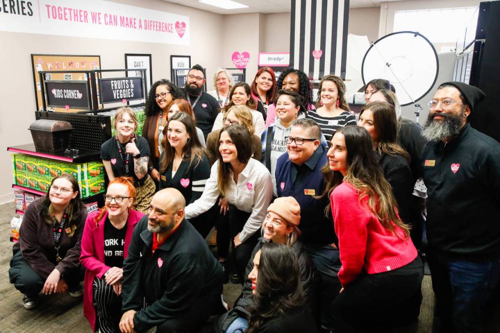 The Just One Project’s team poses for a photo at the grand opening of the community mark ...