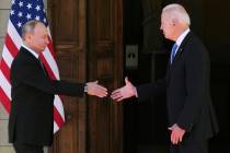 President Joe Biden and Russian President Vladimir Putin, arrive to meet at the 'Villa la Grang ...