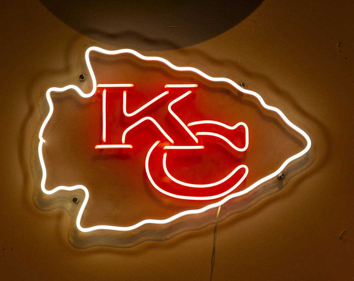 A lighted sign in the Jackpot Bar, a Kansas City Chiefs bar which features members of the KC CH ...